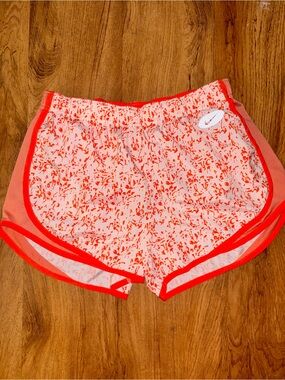 Nike Women’s White Shorts with Coral Print and Orange Trim